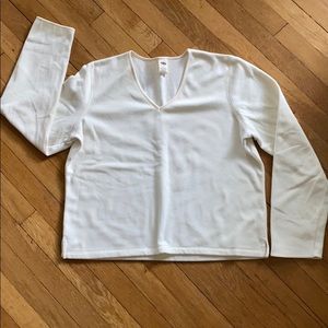 ON cream colored pajama top.